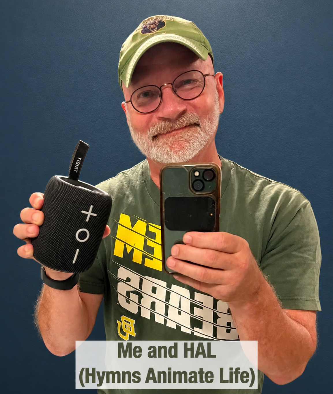 HAL & me Len Kinzel, the chaplain, holding up his bluetooth speaker.